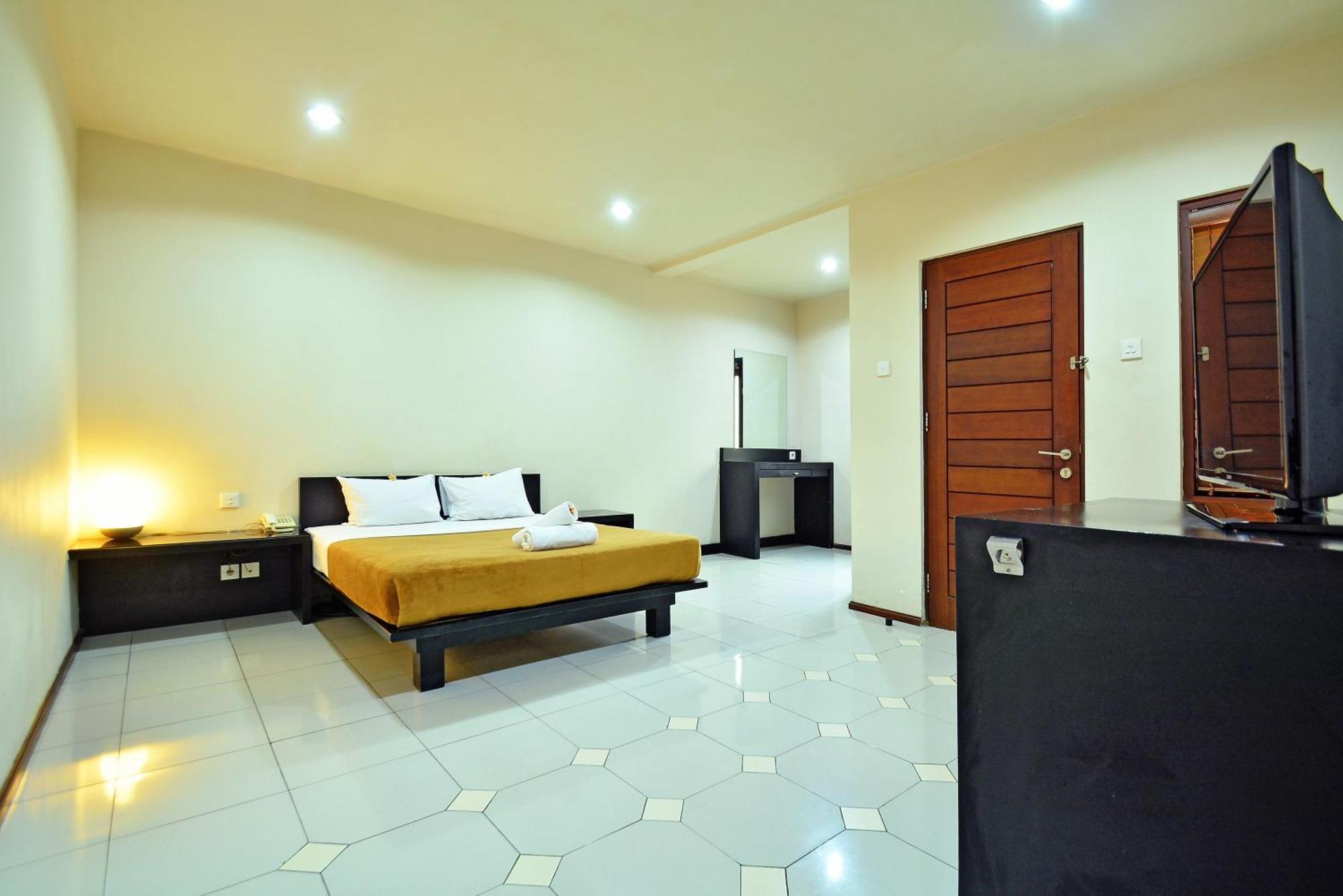 Aparthotel Taman Ayu Town House Legian Habitación foto
